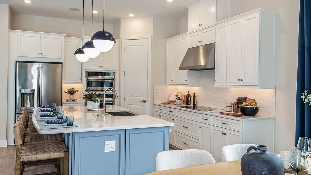 Furnished interior in a model home at Esplanade Lake Club in Fort Myers (Image 10). Furnished interior in a model home at Esplanade Lake Club in Fort Myers (Image 10).