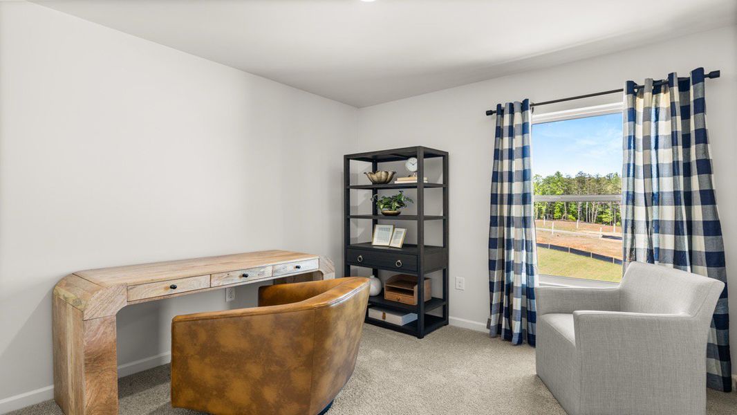 Furnished interior in a model home at Waypoint in Flowery Branch (Image 19).