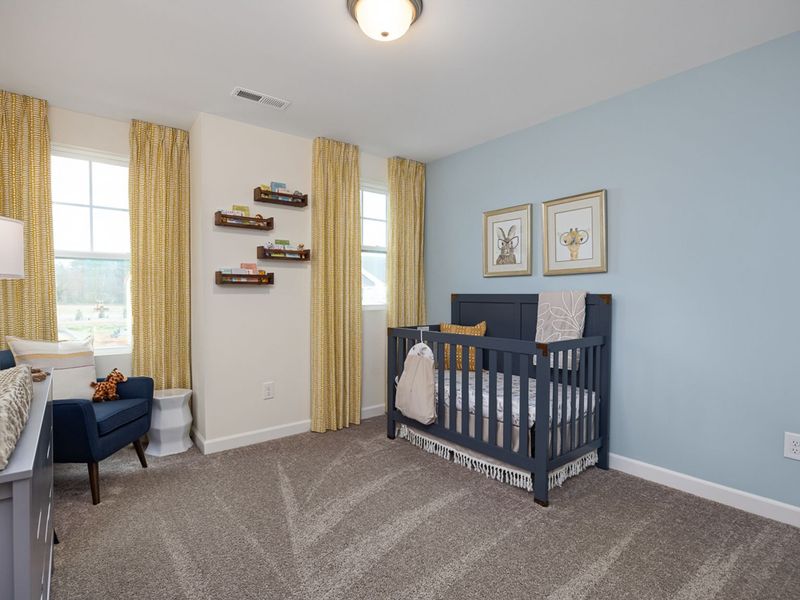 Furnished interior in a model home at Gregory Village Townhomes in Lillington (Image 17).