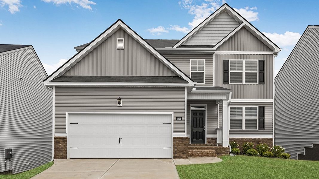 Front exterior of a home in the Wrenfield at Chanticleer community, located in North Augusta, SC (Image 9).