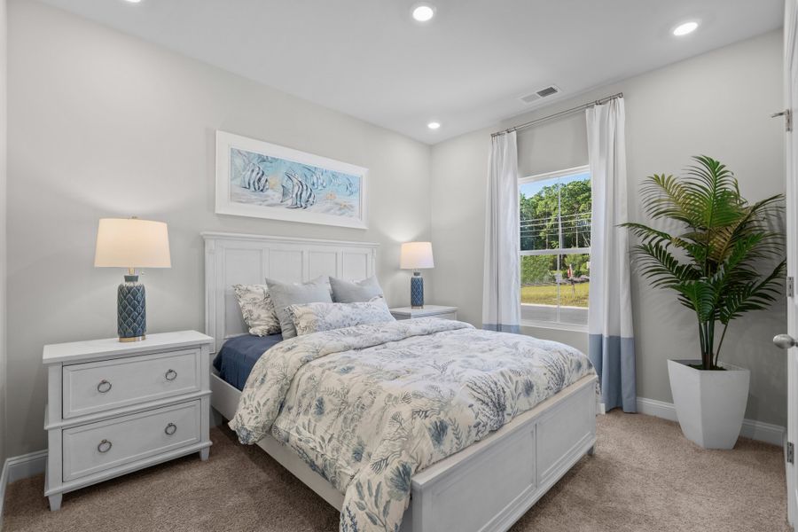 Furnished interior in a model home at Creekview Landing in Shallotte (Image 26).