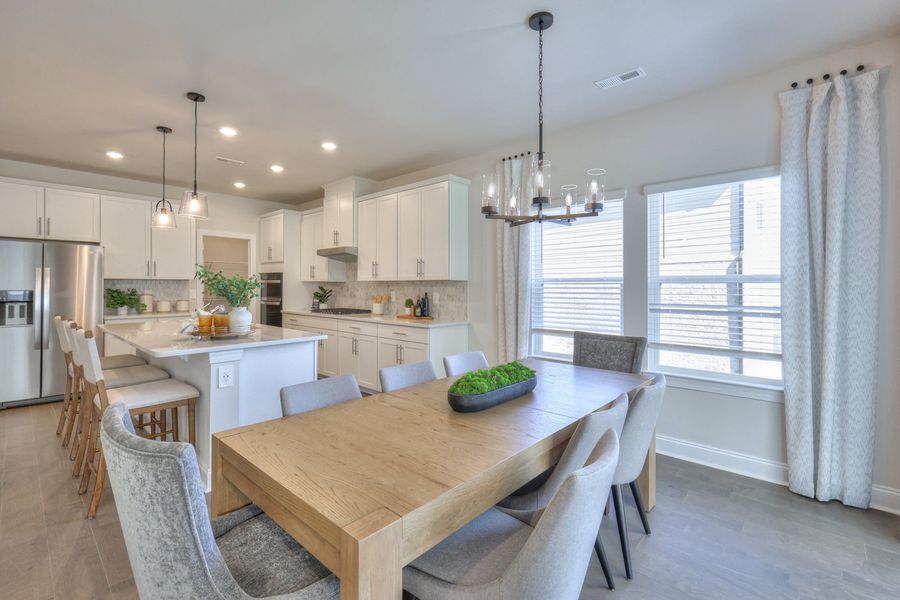 The island overlooks the dining area and great room.