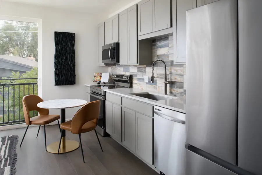 Furnished interior in a model home at The Scene at Sloan's Lake in Denver (Image 5).