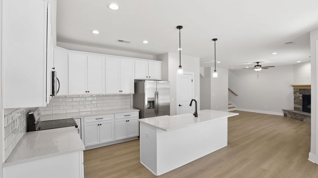 Furnished interior in a model home at Bentley Manor in Greer (Image 7).