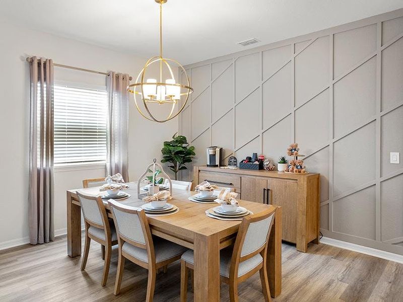 Meals are a delight in this sunny dining space - Summerlyn II model home in Auburndale, FL