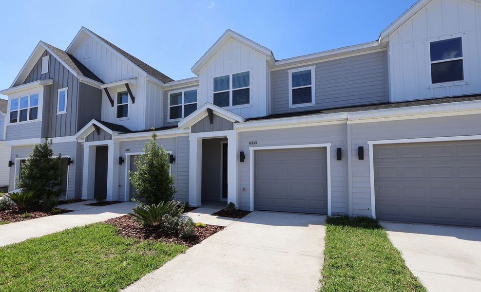 Front exterior of a home in the Waterset Townhomes community, located in Apollo Beach, FL (Image 2). Front exterior of a home in the Waterset Townhomes community, located in Apollo Beach, FL (Image 2).