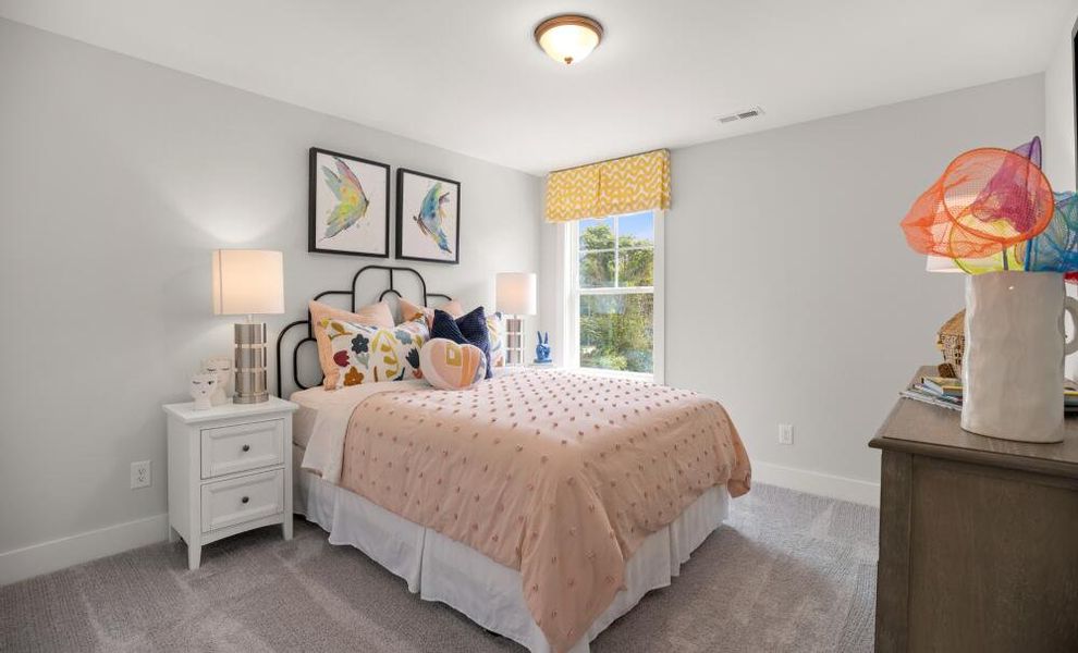 Furnished interior in a model home at Johnston Park Townhomes in Charlotte (Image 10). Furnished interior in a model home at Johnston Park Townhomes in Charlotte (Image 10).