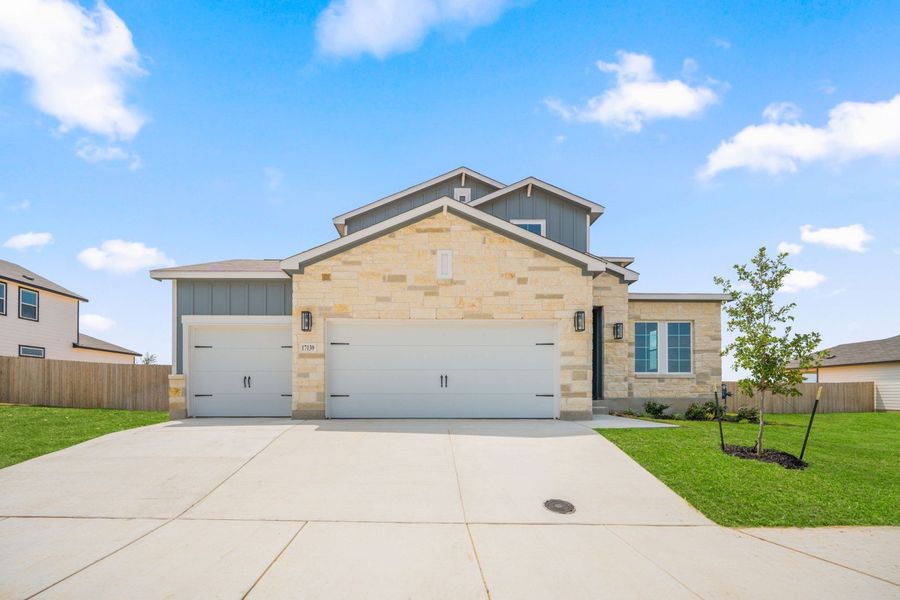Front exterior of a home in the Hickory Ridge Estates community, located in Elmendorf, TX (Image 30).