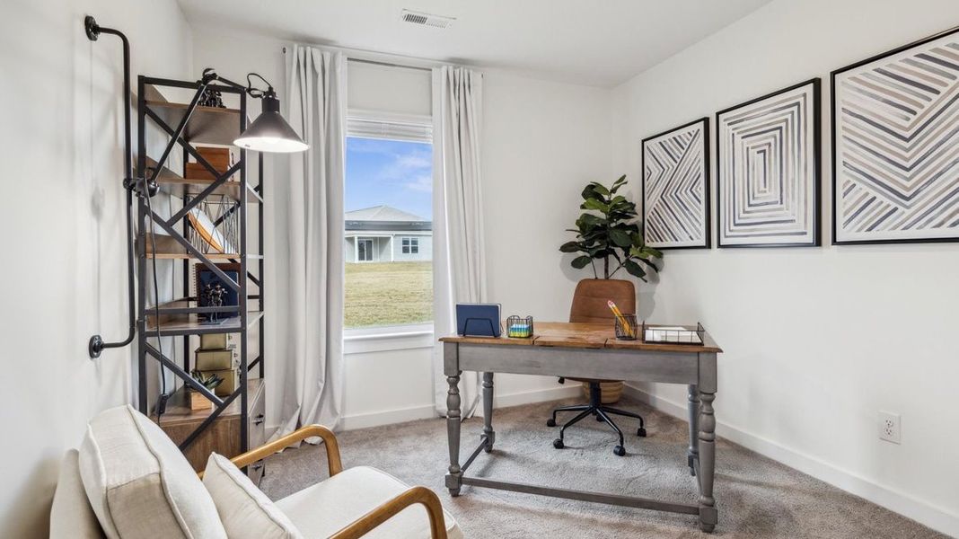 Furnished interior in a model home at Battle Ridge in Jefferson City (Image 24).