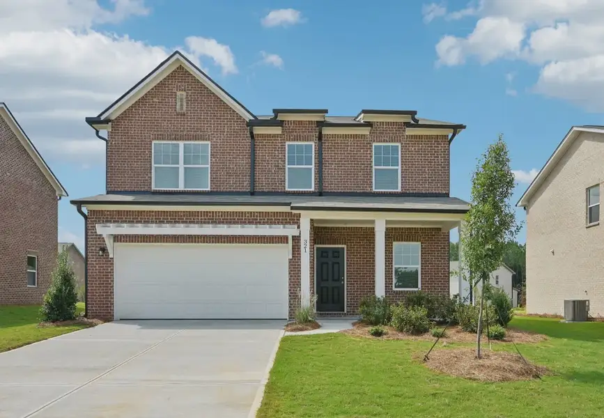Front exterior of a home in the Kendall Grove community, located in McDonough, GA (Image 4).