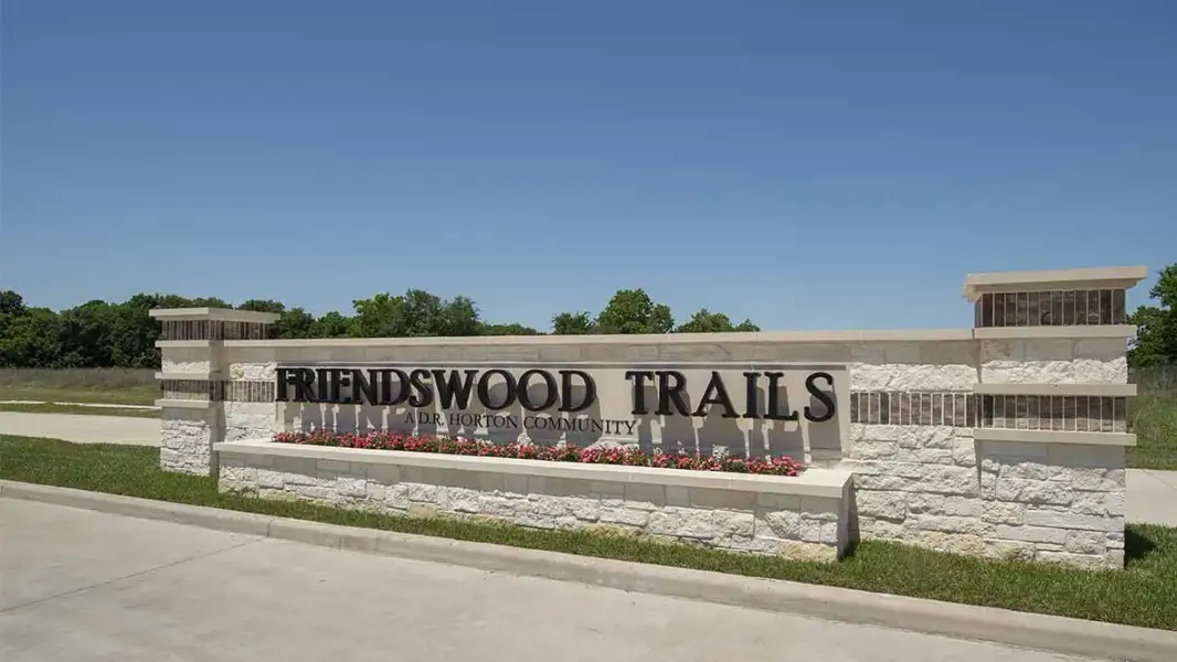 Entrance to the Friendswood Trails 60' Homesites community in Friendswood, TX, featuring signage and landscaping (Image 12).