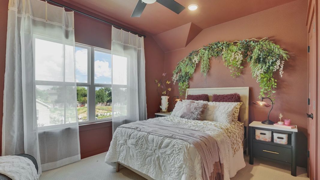 Furnished interior in a model home at Creeks Crossing in Elgin (Image 34).