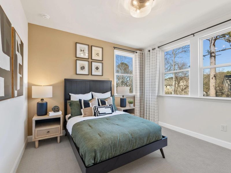 Furnished interior in a model home at Fern Hollow in Buford (Image 17).