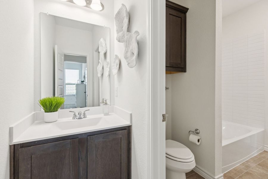 Furnished interior in a model home at Eagle Cove in Denton (Image 22).