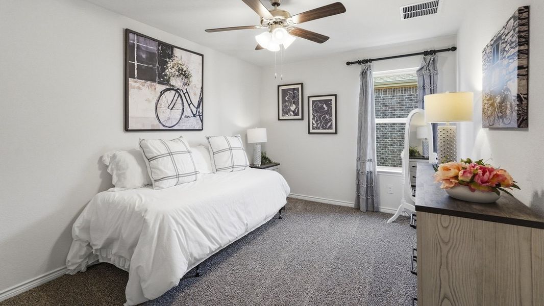 Furnished interior in a model home at The Woods at Lindsey Place in Anna (Image 75).