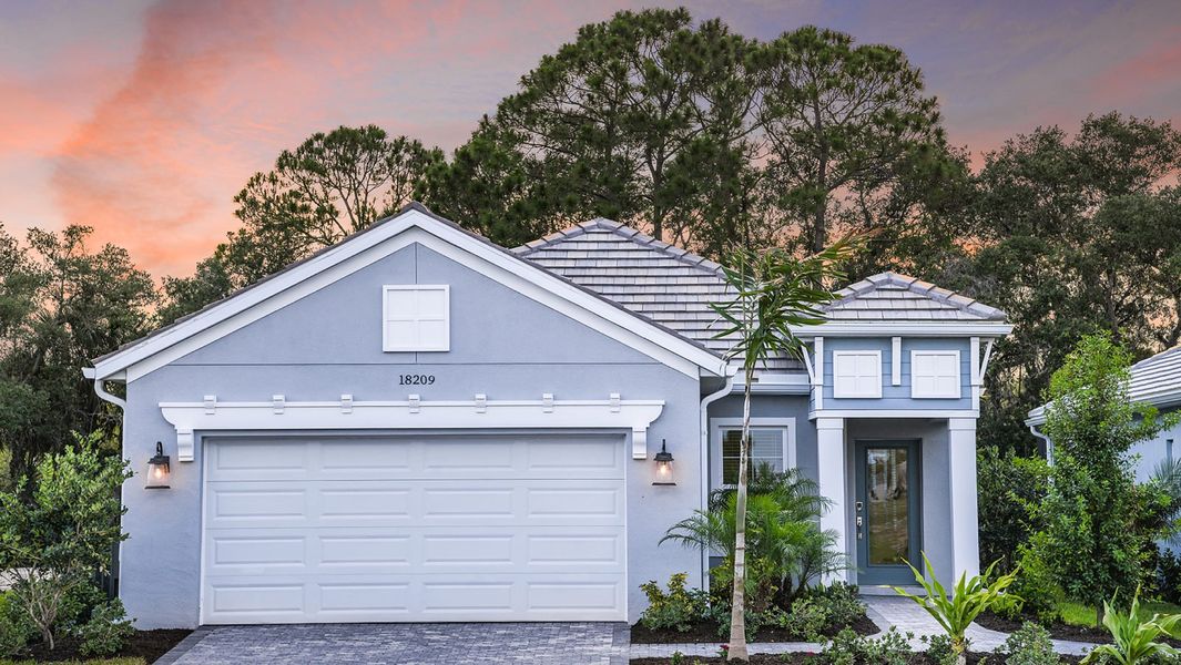 Front exterior of a home in the Wysteria community, located in Venice, FL (Image 5).