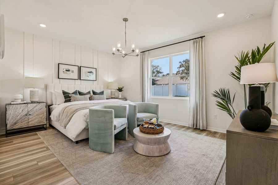 Furnished interior in a model home at Country Club Estates in Palm Bay (Image 11).