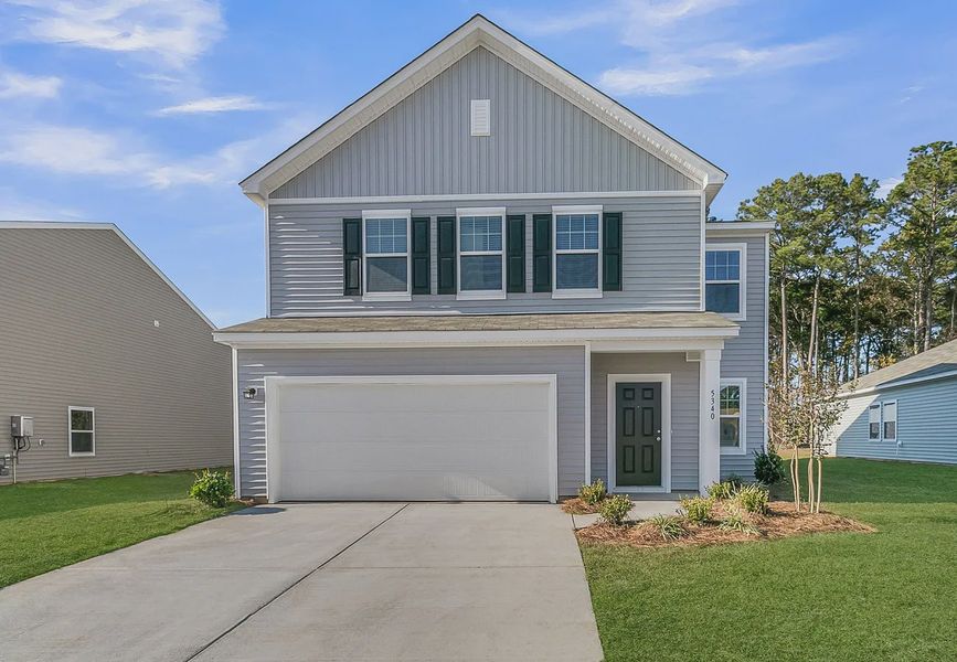 Front exterior of a home in the Pender Woods at Cane Bay community, located in Summerville, SC (Image 10).