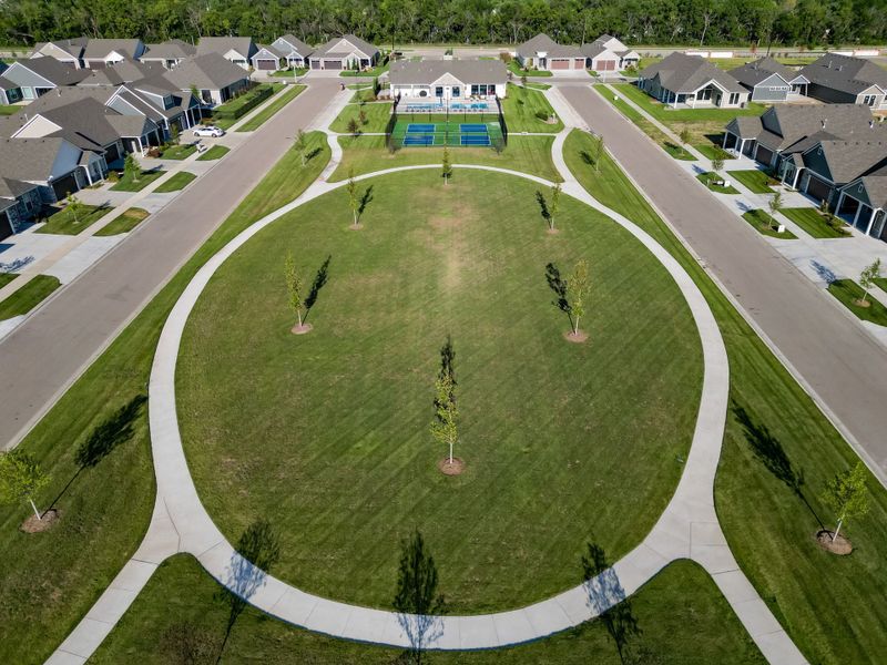 Aerial view of the The Courtyards at The Heritage community in Andover, KS, showing layout and nearby surroundings (Image 28). Aerial view of the The Courtyards at The Heritage community in Andover, KS, showing layout and nearby surroundings (Image 28).