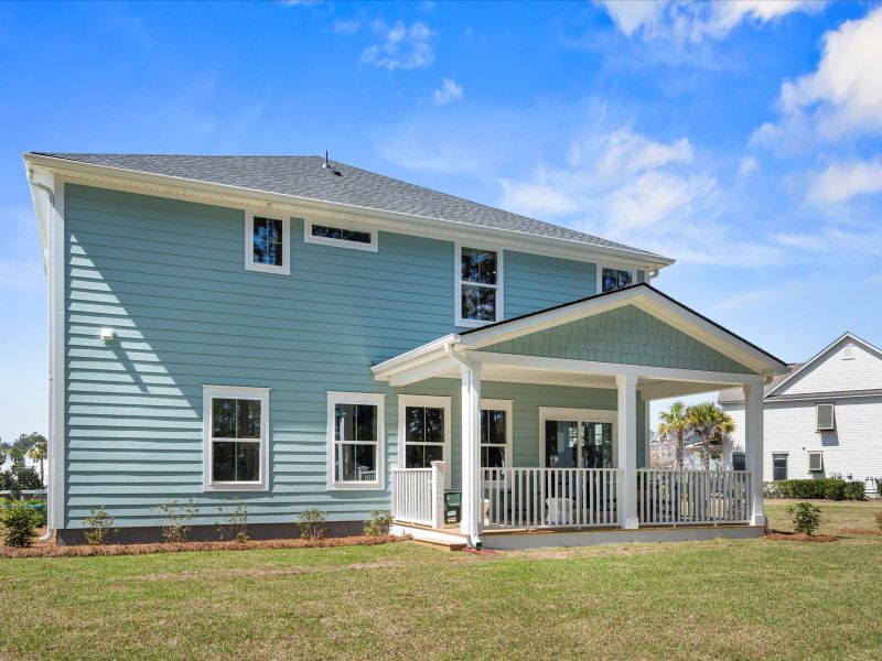 A covered rear deck is a great spot for relaxing outdoors.