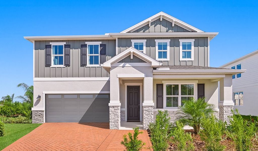 Front exterior of a home in the Seaport Village community, located in Tavares, FL (Image 2).