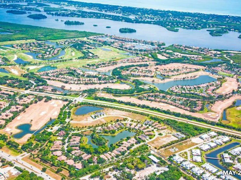 Aerial view of the The Falls at Grand Harbor community in Vero Beach, FL, showing layout and nearby surroundings (Image 24).