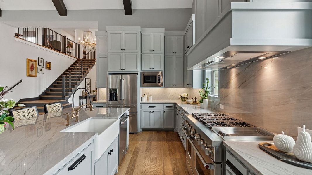 Furnished interior in a model home at Windsong Ranch 71' Series in Prosper (Image 38).