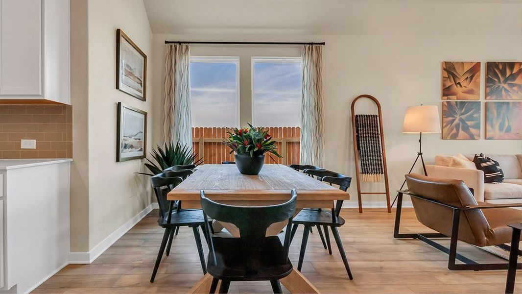 Furnished interior in a model home at Prairie Oaks in Oak Point (Image 11).