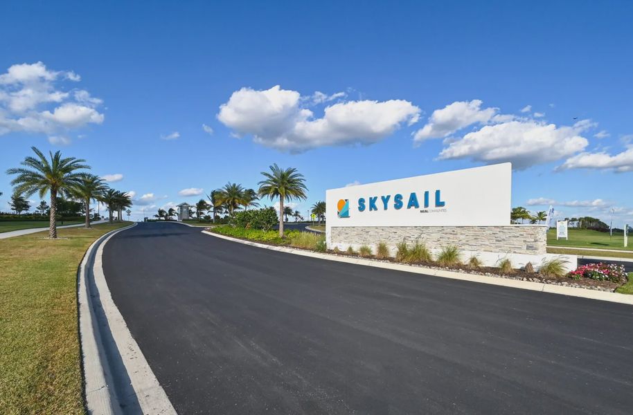 Entrance to the SkySail community in Naples, FL, featuring signage and landscaping (Image 1). Entrance to the SkySail community in Naples, FL, featuring signage and landscaping (Image 1).