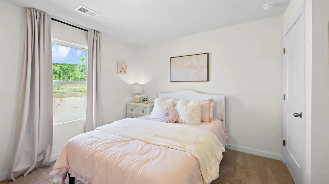 Furnished interior in a model home at Morgan Farms in Ooltewah (Image 11).