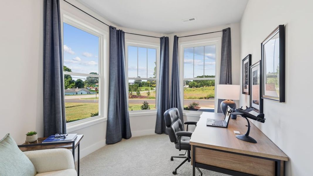 Furnished interior in a model home at Ken's Crossing in Moore (Image 19).
