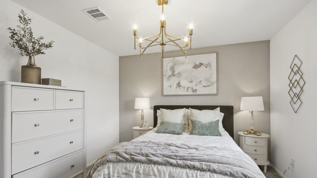 Furnished interior in a model home at Harrington Trails at The Canopies in New Caney (Image 8).