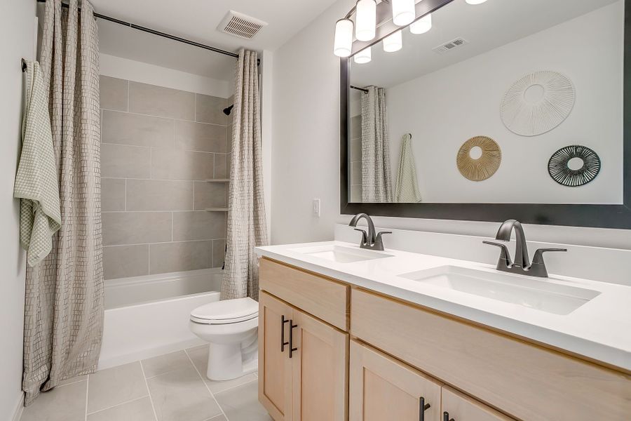 Furnished interior in a model home at Creekside in Royse City (Image 51).