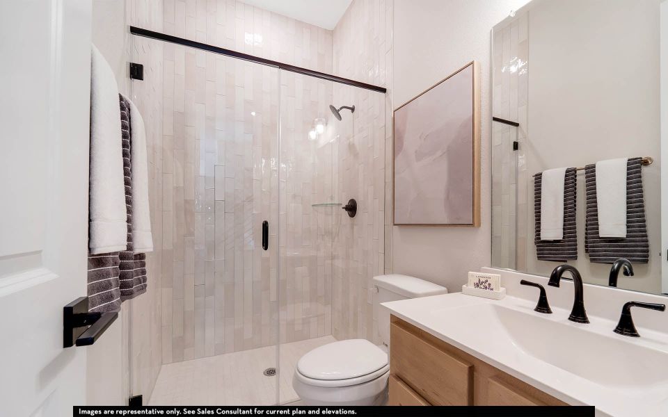 Furnished interior in a model home at The Summit at Center Stage in Keller (Image 11).