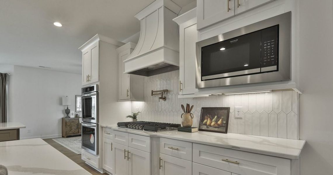 Furnished interior in a model home at Ellerbe in Newnan (Image 8).