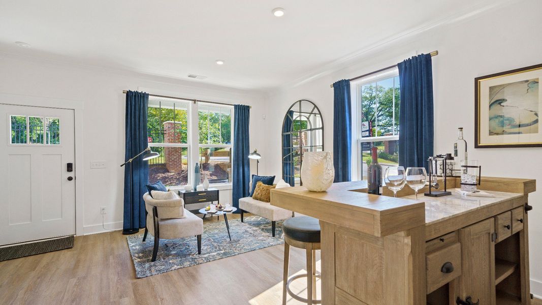 Furnished interior in a model home at Montgomery Chase in Greenville (Image 4).