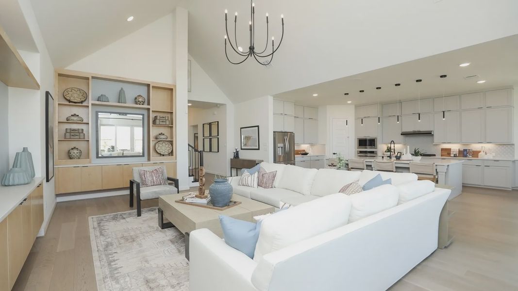 Experience luxury in Brookewater with airy vaulted ceilings and sleek, modern kitchen design. Experience luxury in Brookewater with airy vaulted ceilings and sleek, modern kitchen design.