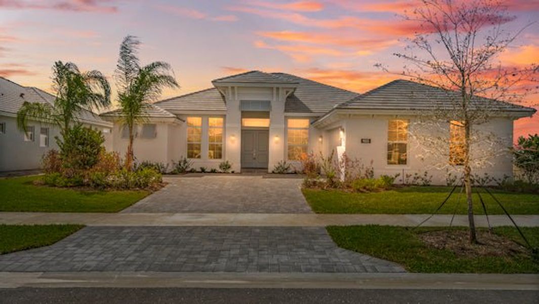 Front exterior of a home in the BELTERRA community, located in Port St. Lucie, FL (Image 65).