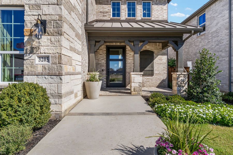 Plan 1687 North Sky 65s Front Porch Photo by American Legend Homes