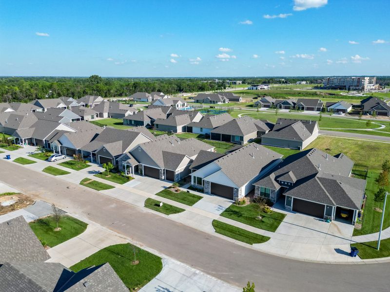 Aerial view of the The Courtyards at The Heritage community in Andover, KS, showing layout and nearby surroundings (Image 20). Aerial view of the The Courtyards at The Heritage community in Andover, KS, showing layout and nearby surroundings (Image 20).