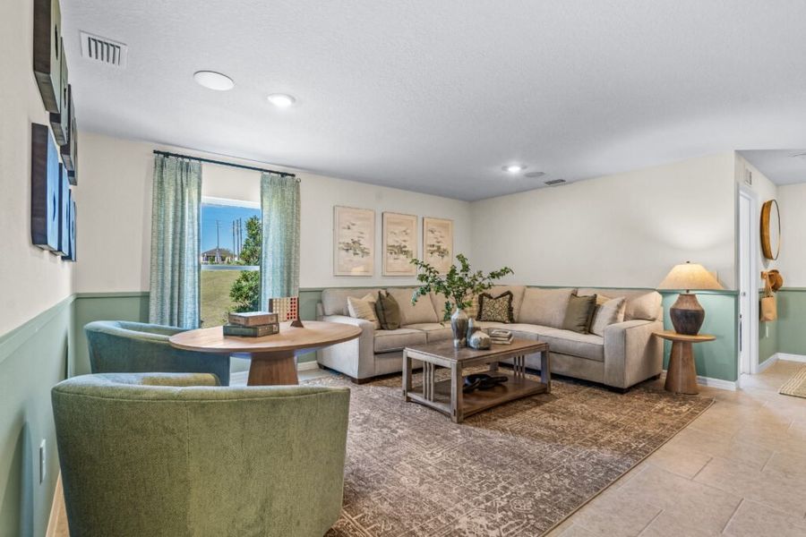 Furnished interior in a model home at Woodland Ranch Estates in Dundee (Image 6).