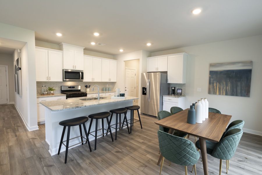 Furnished interior in a model home at Vickery Station in Woodruff (Image 4).