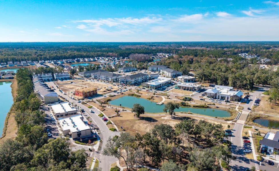 Aerial view of the New Riverside Village community in Bluffton, SC, showing layout and nearby surroundings (Image 13).