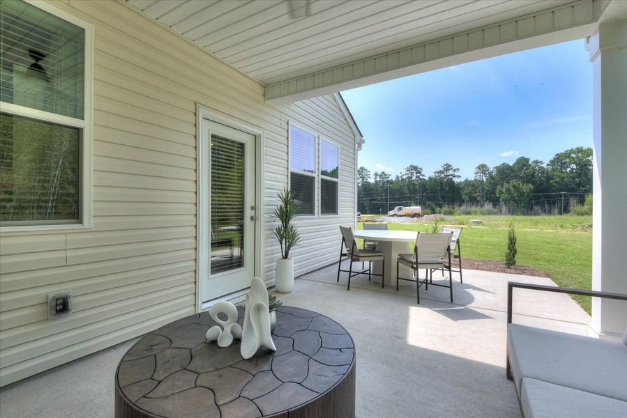 Outdoor living space offer a perfect spot for fresh air, morning coffee, or dining al fresco Outdoor living space offer a perfect spot for fresh air, morning coffee, or dining al fresco