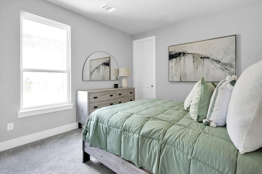 Furnished interior in a model home at Polo Ridge in Forney (Image 28).