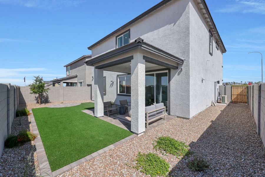 A house with a stone driveway. A house with a stone driveway.