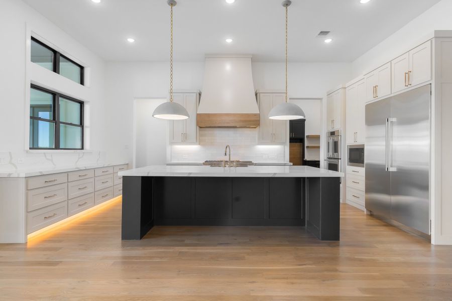 Furnished interior in a model home at Enchanted Creek in Lucas (Image 18).