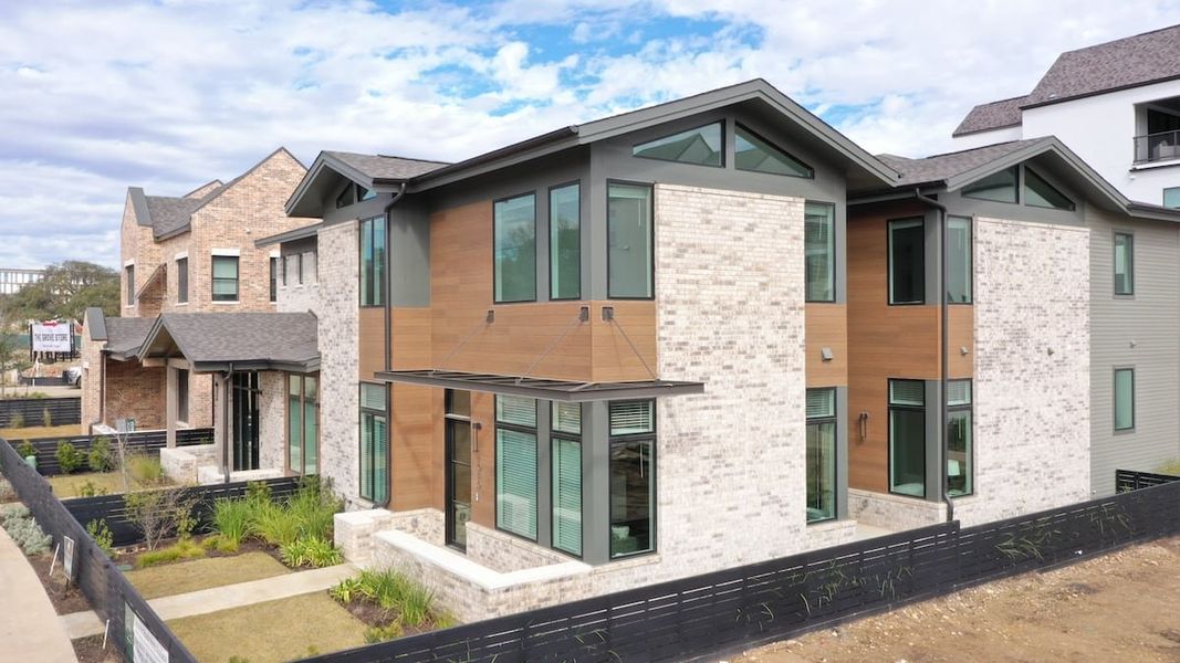 Front exterior of a home in the The Grove At Shoal Creek community, located in Austin, TX (Image 4).