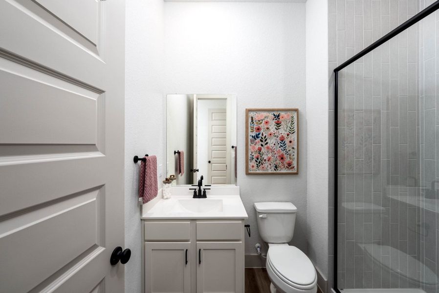 Furnished interior in a model home at Weltner Farms 60’s in New Braunfels (Image 40).