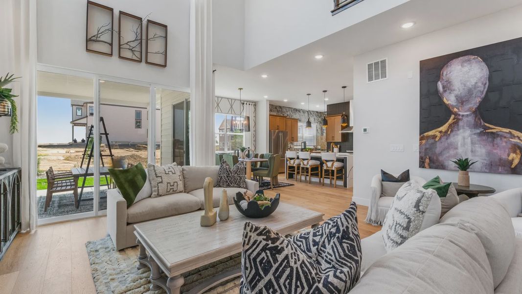 Luxurious open-plan space with soaring ceilings, elegant finishes, and expansive windows in Dillon Pointe. Luxurious open-plan space with soaring ceilings, elegant finishes, and expansive windows in Dillon Pointe.